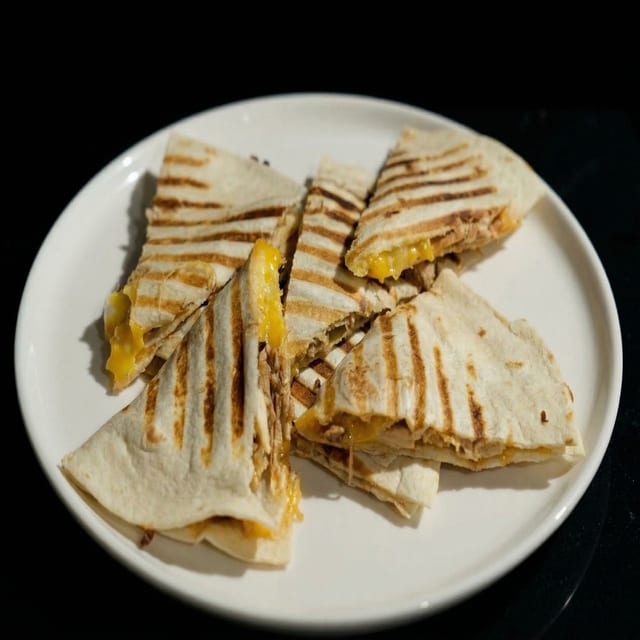 Cheese Quesadilla with Sauce.